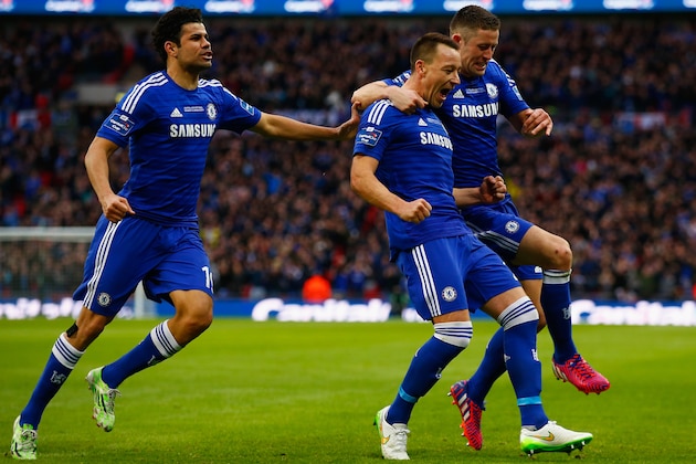 LONDON, ENGLAND - MARCH 01:  John Terry of Chelsea (C) celebrates scoring the opening goal with Diego Costa and Gary Cahill of Chelsea during the Capital One Cup Final match between Chelsea and Tottenham Hotspur at Wembley Stadium on March 1, 2015 in London, England.  (Photo by Clive Rose/Getty Images)
