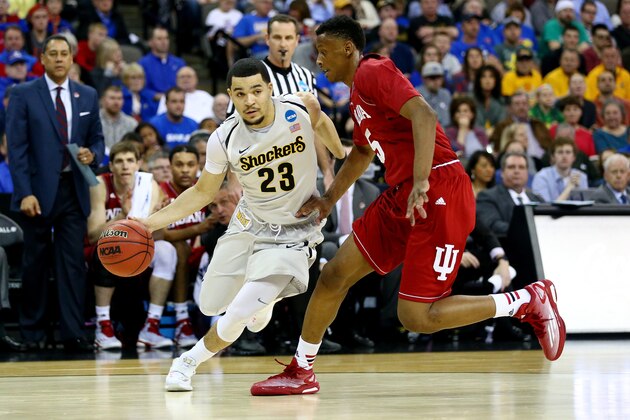 OMAHA, NE - MARCH 20: Fred VanVleet #23 of the Wichita State Shockers drives to the basket as Troy Williams #5 of the Indiana Hoosiers defends during the second round of the 2015 NCAA Men's Basketball Tournament at the CenturyLink Center on March 20, 2015 in Omaha, Nebraska.  (Photo by Ronald Martinez/Getty Images)