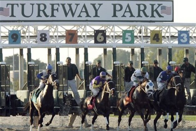 FILE - In this file photo taken Sept. 7, 2005, horses break out of the gate on the new Polytrack surface at Turfway Park  in Florence, Ky. While tracks in other states have parlayed casino gambling into higher purses. Kentucky lawmakers have resisted allowing such a move. Track executives says that without the infusion of casino gambling money, the winter haven for Kentucky horse racing could someday turn into a shopping mall. (AP Photo/Al Behrman, File)