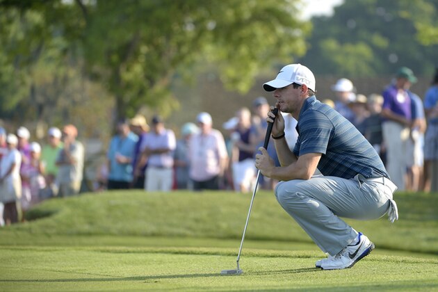 Rory McIlroy, of Northern Ireland, lines up a putt on the 13th green during the second round of the Arnold Palmer Invitational golf tournament in Orlando, Fla., Friday, March 20, 2015.(AP Photo/Phelan M. Ebenhack)