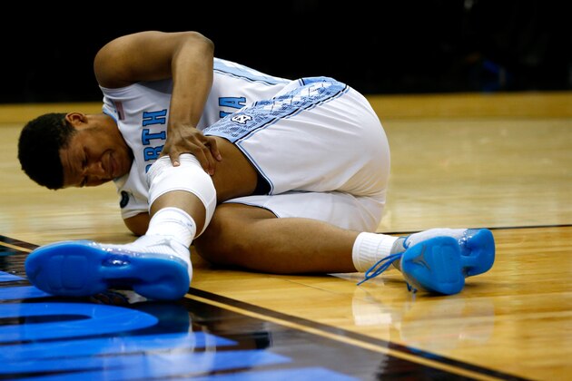 JACKSONVILLE, FL - MARCH 21:  Kennedy Meeks #3 of the North Carolina Tar Heels is injured against the Arkansas Razorbacks in the second half during the third round of the 2015 NCAA Men's Basketball Tournament at Jacksonville Veterans Memorial Arena on March 21, 2015 in Jacksonville, Florida.  (Photo by Kevin C. Cox/Getty Images)