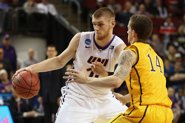 SEATTLE, WA - MARCH 20:  Seth Tuttle #10 of the Northern Iowa Panthers drives against Josh Adams #14 of the Wyoming Cowboys during the second round of the 2015 Men's NCAA Basketball Tournament at KeyArena on March 20, 2015 in Seattle, Washington.  (Photo by Otto Greule Jr/Getty Images)