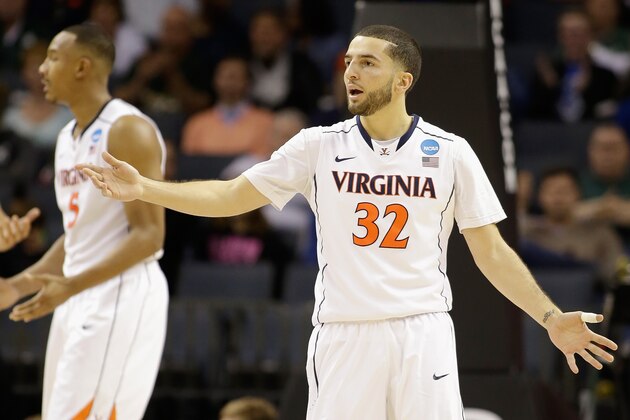 CHARLOTTE, NC - MARCH 20:  London Perrantes #32 of the Virginia Cavaliers reacts after a play against the Belmont Bruins during the second round of the 2015 NCAA Men's Basketball Tournament at Time Warner Cable Arena on March 20, 2015 in Charlotte, North Carolina.  (Photo by Bob Leverone/Getty Images)