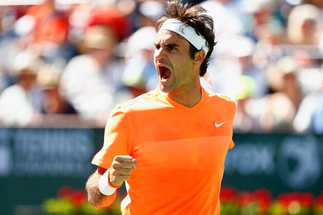 INDIAN WELLS, CA - MARCH 21:  Roger Federer of Switzerland celebrates winning a point against Milos Raonic of Canada during day thirteen of the BNP Paribas Open tennis at the Indian Wells Tennis Garden on March 21, 2015 in Indian Wells, California.  (Photo by Julian Finney/Getty Images)