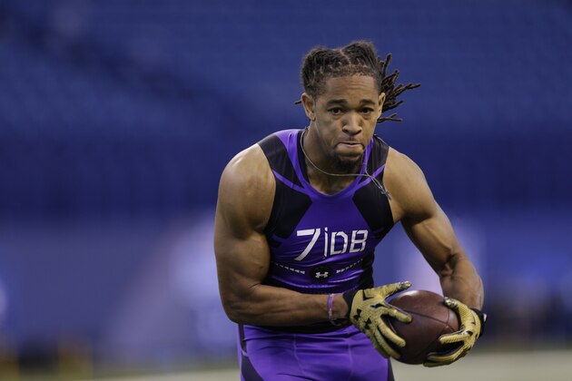 LSU defensive back Jalen Collins runs a drill at the NFL football scouting combine in Indianapolis, Monday, Feb. 23, 2015. (AP Photo/David J. Phillip)