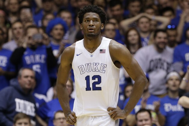 Duke's Justise Winslow (12) looks on during the second half of an NCAA college basketball game against Syracuse in Durham, N.C., Saturday, Feb. 28, 2015. Duke won 73-54. (AP Photo/Gerry Broome)