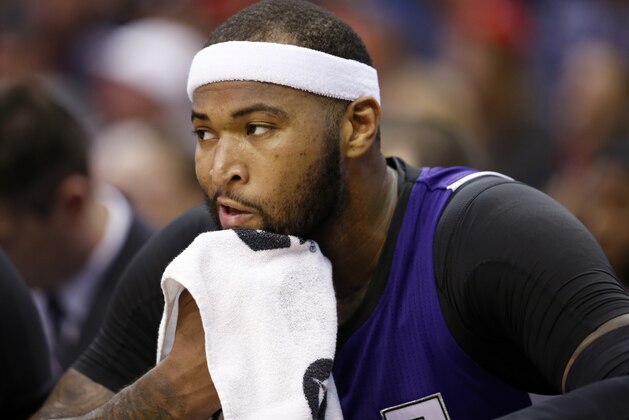 Sacramento Kings center DeMarcus Cousins (15) sits on the bench after he fouled out in the second half of an NBA basketball game against the Washington Wizards, Saturday, March 14, 2015, in Washington. The Wizards won 113-97. (AP Photo/Alex Brandon)