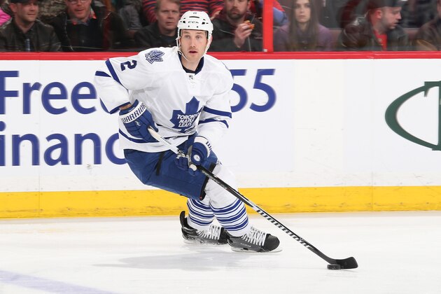 OTTAWA, ON - MARCH 21: Playing in his 1,000th career NHL game, Eric Brewer #2 of the Toronto Maple Leafs stickhandles the puck against the Ottawa Senators at Canadian Tire Centre on March 21, 2015 in Ottawa, Ontario, Canada.  (Photo by Andre Ringuette/NHLI via Getty Images)