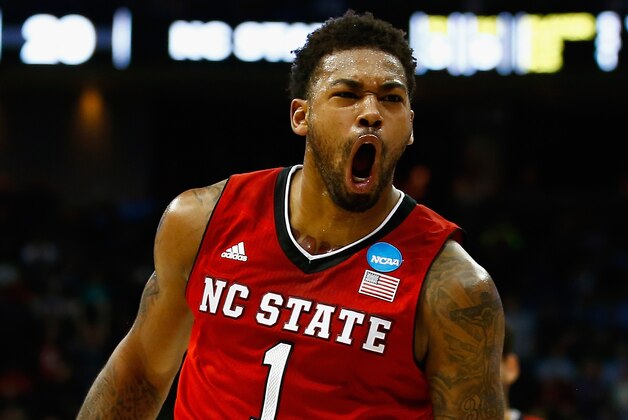 PITTSBURGH, PA - MARCH 21:  Trevor Lacey #1 of the North Carolina State Wolfpack celebrates after hitting a three pointer at the end of the first half against the Villanova Wildcats during the third round of the 2015 NCAA Men's Basketball Tournament at Consol Energy Center on March 21, 2015 in Pittsburgh, Pennsylvania.  (Photo by Jared Wickerham/Getty Images)