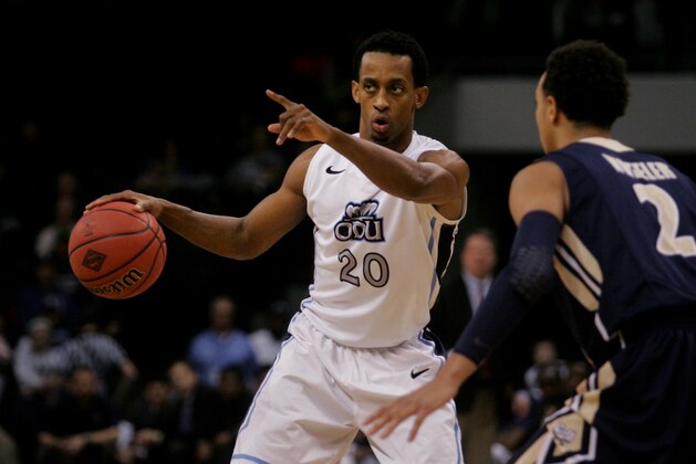 Old Dominion's Trey Freeman (20) controls the offense as Charleston Southern's Aaron Wheeler (2) defends during the first half of an NCAA college basketball game in the National Invitational Tournament, Wednesday, March 18, 2015 in Norfolk, Va.  (AP Photo/Jason Hirschfeld)