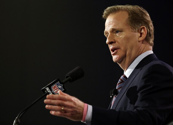 NFL Commissioner Roger Goodell participates in a news conference for NFL Super Bowl XLIX football game Friday, Jan. 30, 2015, in Phoenix. (AP Photo/David J. Phillip)