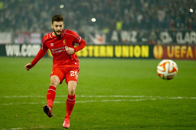 ISTANBUL, TURKEY - FEBRUARY 26:  Adam Lallana of Liverpool scores his penalty in the shoot out during the 2nd leg of the UEFA Europa League Round of 32 match between Besiktas and Liverpool at the Ataturk Olympic Stadium on February 26, 2015 in Istanbul, Turkey.  (Photo by Richard Heathcote/Getty Images)