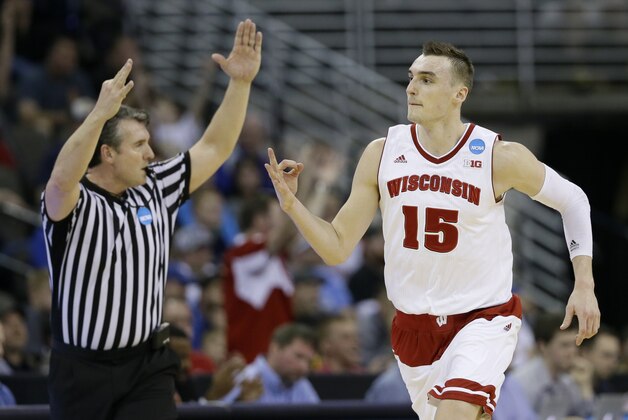 Wisconsin forward Sam Dekker reacts after making a three-point basket during the second half of an NCAA college basketball tournament Round of 32 game against Oregon, Sunday, March 22, 2015, in Omaha, Neb. (AP Photo/Charlie Neibergall) Wisconsin forward Sam Dekker reacts after making a three-point basket during the second half of an NCAA college basketball tournament Round of 32 game against Oregon, Sunday, March 22, 2015, in Omaha, Neb. (AP Photo/Charlie Neibergall)