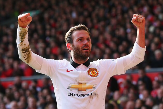 LIVERPOOL, ENGLAND - MARCH 22:  Juan Mata of Manchester United celebrates scoring his second goal during the Barclays Premier League match between Liverpool and Manchester United at Anfield on March 22, 2015 in Liverpool, England.  (Photo by Alex Livesey/Getty Images)