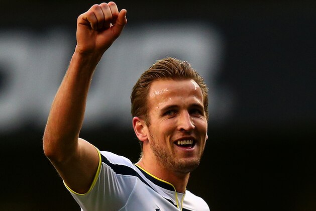 LONDON, ENGLAND - MARCH 21:  Harry Kane of Spurs celebrates with the match ball after his hat-trick in the Barclays Premier League match between Tottenham Hotspur and Leicester City at White Hart Lane on March 21, 2015 in London, England.  (Photo by Clive Rose/Getty Images)