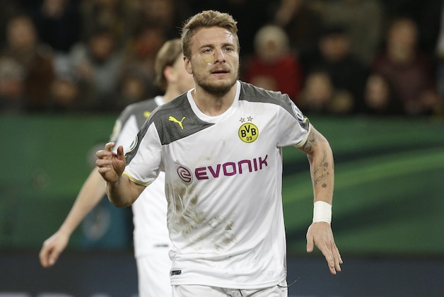 Dortmund's Ciro Immobile from Italy celebrates after scoring his side's 2nd goal during the German soccer cup round of sixteen match between third division team Dynamo Dresden and first division team Borussia Dortmund in Dresden, Germany, Tuesday, March 3, 2015. (AP Photo/Michael Sohn)