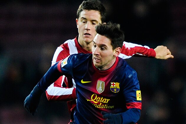 BARCELONA, SPAIN - DECEMBER 01:  Lionel Messi of FC Barcelona duels for the ball with Ander Herrera of Athletic Club during the La Liga match between FC Barcelona and Athletic Club at Camp Nou on December 1, 2012 in Barcelona, Spain.  (Photo by David Ramos/Getty Images)
