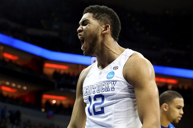 LOUISVILLE, KY - MARCH 19:  Karl-Anthony Towns #12 of the Kentucky Wildcats reacts against the Hampton Pirates during the second round of the 2015 NCAA Men's Basketball Tournament at the KFC YUM! Center on March 19, 2015 in Louisville, Kentucky.  (Photo by Andy Lyons/Getty Images)