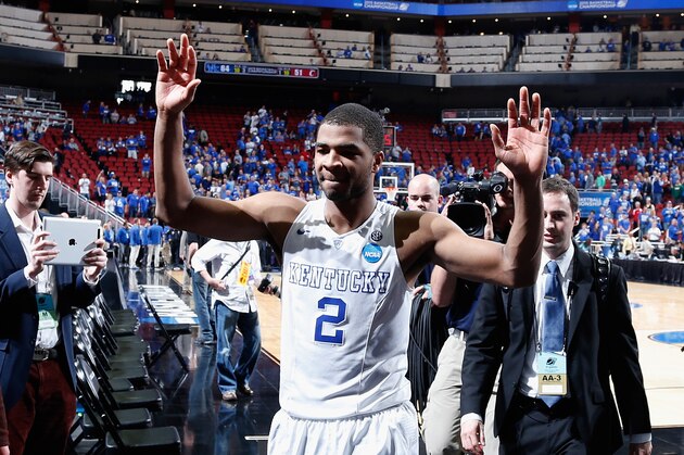 LOUISVILLE, KY - MARCH 21:  Aaron Harrison #2 of the Kentucky Wildcats walks off the court after defeating the Cincinnati Bearcats 64-51 during the third round of the 2015 NCAA Men's Basketball Tournament at KFC YUM! Center on March 21, 2015 in Louisville, Kentucky.  (Photo by Joe Robbins/Getty Images)