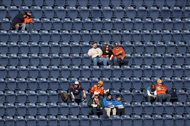 DENVER - DECEMBER 26:  Fans begin to occupy the empty seats prior to the game as the Denver Broncos host the Houston Texas at INVESCO Field at Mile High on December 26, 2010 in Denver, Colorado. The Broncos defeated the Texans 24-23.  (Photo by Doug Pensinger/Getty Images)