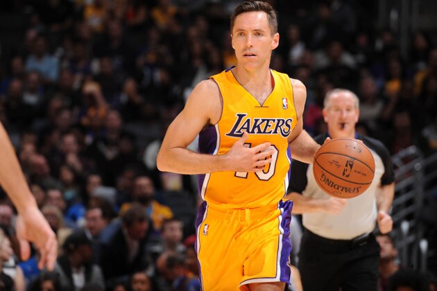 LOS ANGELES, CA - APRIL 4: Steve Nash #10 of the Los Angeles Lakers handles the ball against the Dallas Mavericks at Staples Center on April 4, 2014 in Los Angeles, California. NOTE TO USER: User expressly acknowledges and agrees that, by downloading and/or using this Photograph, user is consenting to the terms and conditions of the Getty Images License Agreement. Mandatory Copyright Notice: Copyright 2014 NBAE (Photo by Andrew D. Bernstein/NBAE via Getty Images)