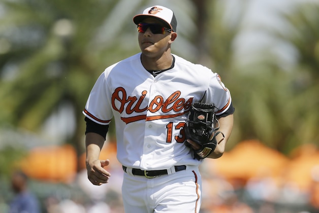 Baltimore Orioles third baseman Manny Machado runs to the dugout during the fifth inning of a spring training exhibition baseball game against the Tampa Bay Rays in Sarasota, Fla., Saturday, March 14, 2015. (AP Photo/Carlos Osorio)