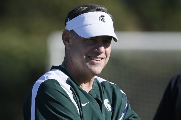 Michigan State coach Mark Dantonio watches practice for the New Year's Day Rose Bowl NCAA college football game against Stanford, Saturday, Dec. 28, 2013, in Carson, Calif. (AP Photo/Danny Moloshok)