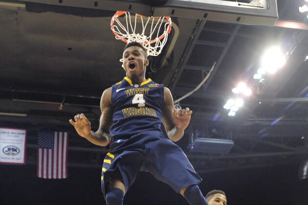 COLUMBUS, OH - MARCH 22: Daxter Miles Jr. #4 of the West Virginia Mountaineers reacts after dunking the ball during the third round of the 2015 NCAA Men's Basketball Tournament on March 22, 2015 at Nationwide Arena in Columbus, Ohio. (Photo by Jamie Sabau/Getty Images)