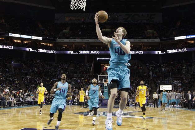Charlotte Hornets' Cody Zeller (40) drives to the basket against the Los Angeles Lakers during the second half of an NBA basketball game in Charlotte, N.C., Tuesday, March 3, 2015. The Hornets won 104-103. (AP Photo/Chuck Burton) Charlotte Hornets' Cody Zeller (40) drives to the basket against the Los Angeles Lakers during the second half of an NBA basketball game in Charlotte, N.C., Tuesday, March 3, 2015. The Hornets won 104-103. (AP Photo/Chuck Burton)