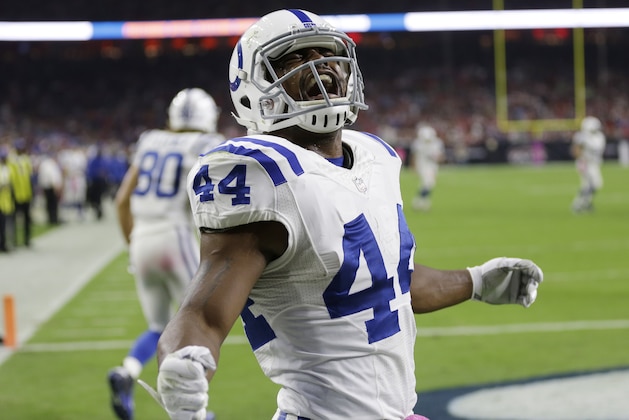 Indianapolis Colts' Ahmad Bradshaw (44) celebrates after he scored against the Houston Texans during the first quarter of an NFL football game, Thursday, Oct. 9, 2014, in Houston. (AP Photo/David J. Phillip)