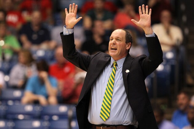 DAYTON, OH - MARCH 14:  Head coach John Becker of the Vermont Catamounts reacts as he coaches against the Lamar Cardinals in the first round of the 2011 NCAA men's basketball tournament at UD Arena on March 14, 2012 in Dayton, Ohio.  (Photo by Gregory Shamus/Getty Images)