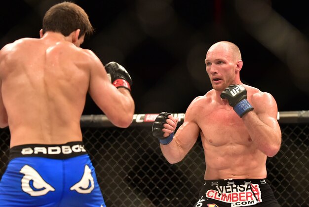 Mar 21, 2015; Rio de Janeiro, RJ, BRAZIL; Demian Maia (red gloves) competes against Ryan LaFlare (blue gloves) during UFC Fight Night at Ginasio do Maracanazinho. Mandatory Credit: Jason Silva-USA TODAY Sports