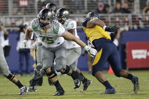 Oregon offensive lineman Jake Fisher (75) in action against California during an NCAA college football game Friday, Oct. 24, 2014, in Santa Clara, Calif. (AP Photo/Marcio Jose Sanchez)