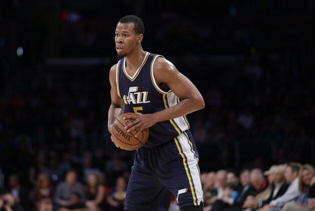 Utah Jazz's Rodney Hood holds the ball during the first half of an NBA basketball game against the Los Angeles Lakers, Thursday, March 19, 2015, in Los Angeles. (AP Photo/Jae C. Hong)