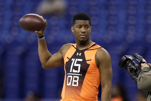 Florida State quarterback Jameis Winston is filmed during a drill  at the NFL football scouting combine in Indianapolis, Saturday, Feb. 21, 2015. (AP Photo/David J. Phillip)