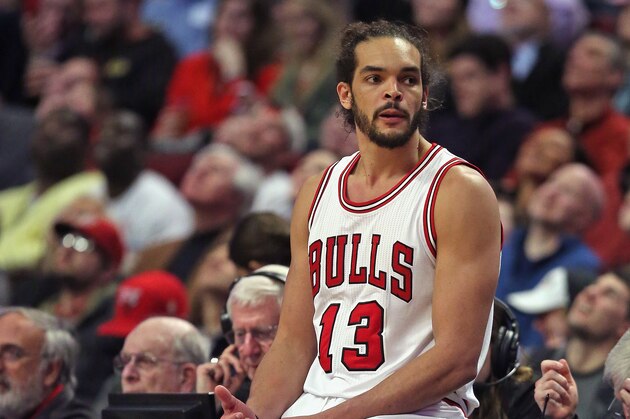 CHICAGO, IL - MARCH 18:  Joakim Noah #13 of the Chicago Bulls sits on the scorers table as he waits for the game to start after a timeout against the Indiana Pacers at the United Center on March 18, 2015 in Chicago, Illinois. The Bulls defeated the Pacers 103-86. NOTE TO USER: User expressly acknowledges and agrees that, by downloading and or using this photograph, User is consenting to the terms and conditions of the Getty Images License Agreement.  (Photo by Jonathan Daniel/Getty Images)