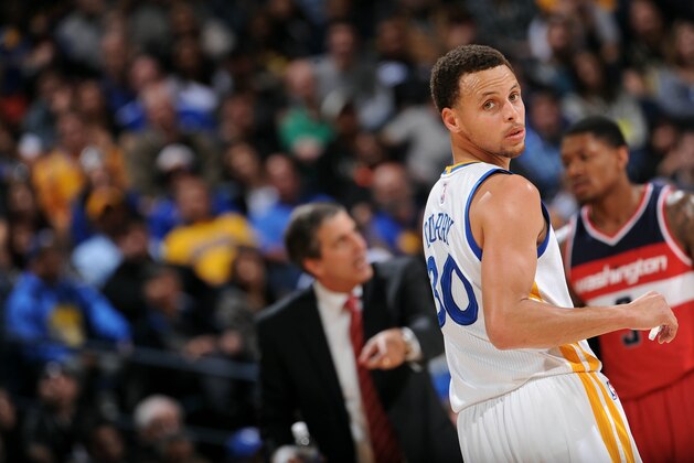 OAKLAND, CA - MARCH 23: Stephen Curry #30 of the Golden State Warriors during a game against the Washington Wizards on March 23, 2015 at Oracle Arena in Oakland, California. NOTE TO USER: User expressly acknowledges and agrees that, by downloading and or using this photograph, user is consenting to the terms and conditions of Getty Images License Agreement. Mandatory Copyright Notice: Copyright 2015 NBAE (Photo by Noah Graham/NBAE via Getty Images)