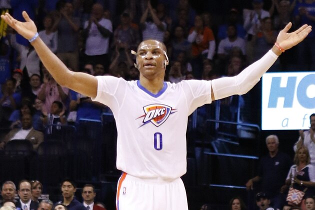Oklahoma City Thunder guard Russell Westbrook (0) gets the fans pumped up during a time out during the second half of an NBA basketball game against Miami Heat in Oklahoma City, Sunday, March 22, 2015. Oklahoma City won 93-75. (AP Photo/Alonzo Adams)