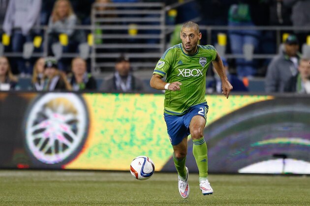 SEATTLE, WA - MARCH 08:  Clint Dempsey #2 of the Seattle Sounders FC dribbles against the New England Revolution at CenturyLink Field on March 8, 2015 in Seattle, Washington.  (Photo by Otto Greule Jr/Getty Images)