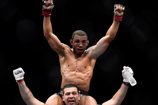 RIO DE JANEIRO, BRAZIL - OCTOBER 25: Jose Aldo of Brazil celebrates after his unanimous-decision victory over Chad Mendes fo the United States in their featherweight championship bout during the UFC 179 event at Maracanazinho on October 25, 2014 in Rio de Janeiro, Brazil. (Photo by Buda Mendes/Getty Images)