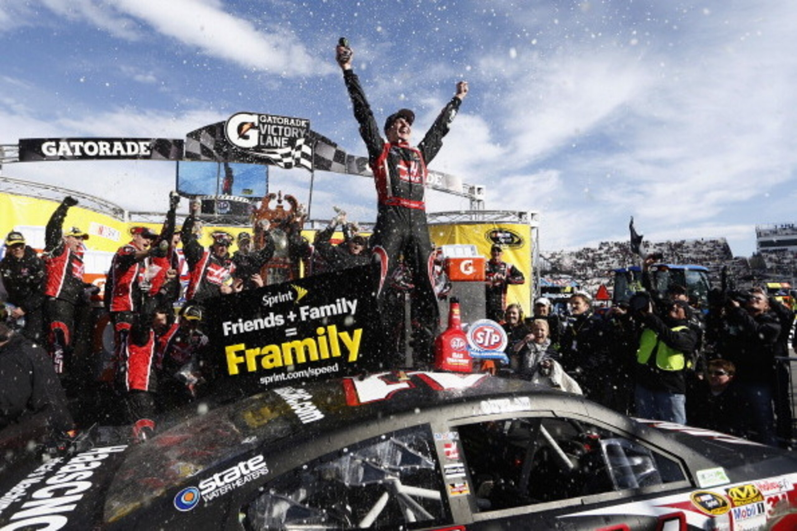 MARTINSVILLE, VA - MARCH 30:  Kurt Busch, driver of the #41 Haas Automation Chevrolet, celebrates in victory lane after winning during the NASCAR Sprint Cup Series STP 500 at Martinsville Speedway on March 30, 2014 in Martinsville, Virginia.  (Photo by Jeff Zelevansky/Getty Images)