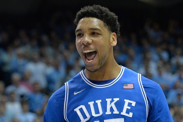 CHAPEL HILL, NC - MARCH 07:  Jahlil Okafor #15 of the Duke Blue Devils reacts after scoring against the North Carolina Tar Heels during their game at the Dean Smith Center on March 7, 2015 in Chapel Hill, North Carolina.  (Photo by Grant Halverson/Getty Images)