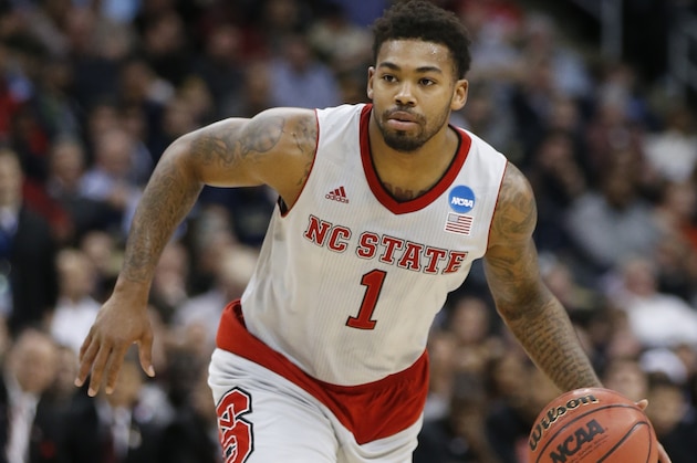 North Carolina State's Trevor Lacey (1) plays against LSU during the first half of an NCAA tournament second round college basketball game, Thursday, March 19, 2015, in Pittsburgh. (AP Photo/Gene J. Puskar)