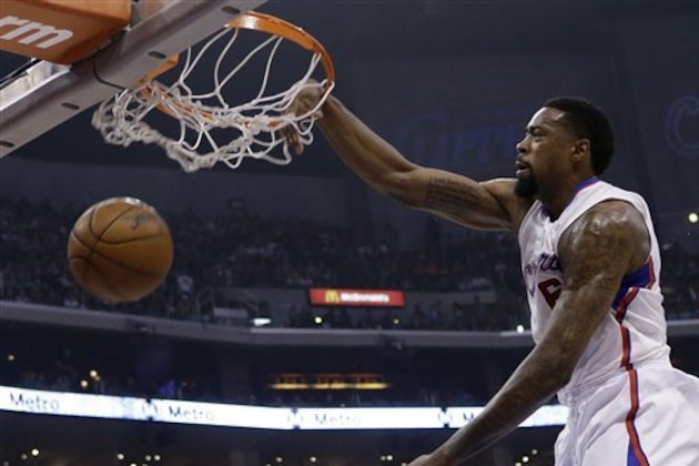Los Angeles Clippers center DeAndre Jordan (6) dunks against the New York Knicks in the first half of an NBA basketball game in Los Angeles Sunday, March 17, 2013. (AP Photo/Reed Saxon)