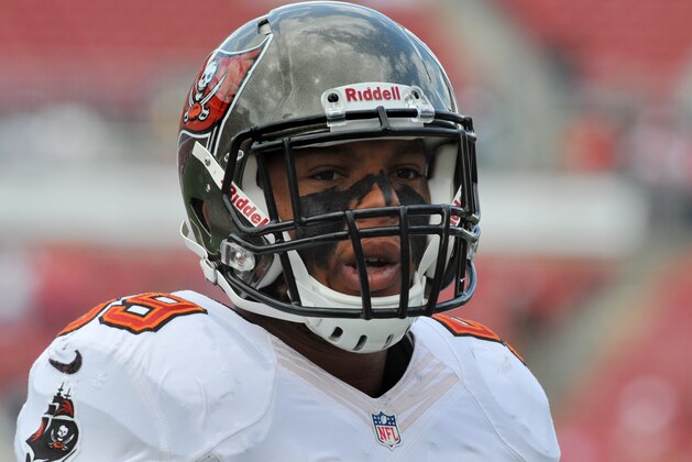 TAMPA, FL - OCTOBER 13: Linebacker Mason Foster #59 of the Tampa Bay Buccaneers warms up for play against the Philadelphia Eagles October 13, 2013 at Raymond James Stadium in Tampa, Florida. (Photo by Al Messerschmidt/Getty Images)