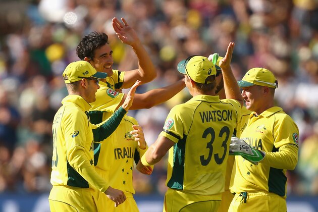 ADELAIDE, AUSTRALIA - MARCH 20:  Mitchell Starc of Australia celebrates with his team after taking the wicket of Wahab Riaz of Pakistan during the 2015 ICC Cricket World Cup match between Australian and Pakistan at Adelaide Oval on March 20, 2015 in Adelaide, Australia.  (Photo by Mark Kolbe/Getty Images)