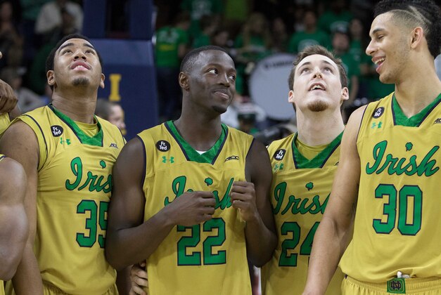 Mar 7, 2015; South Bend, IN, USA; Notre Dame Fighting Irish guard/forward Pat Connaughton (24) and guard Jerian Grant (22) and forward Zach Auguste (30) forward Bonzie Colson (35) after the game against the Clemson Tigers at Purcell Pavilion at the Joyce Center. The Notre Dame Fighting Irish beat the Clemson Tigers by the score of 81-67. Mandatory Credit: Trevor Ruszkowski-USA TODAY Sports