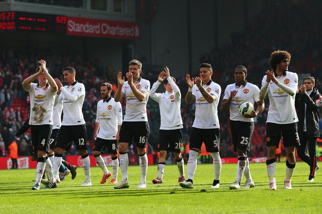 LIVERPOOL, ENGLAND - MARCH 22:  Manchester United players celebrate victory after the Barclays Premier League match between Liverpool and Manchester United at Anfield on March 22, 2015 in Liverpool, England.  (Photo by Alex Livesey/Getty Images)