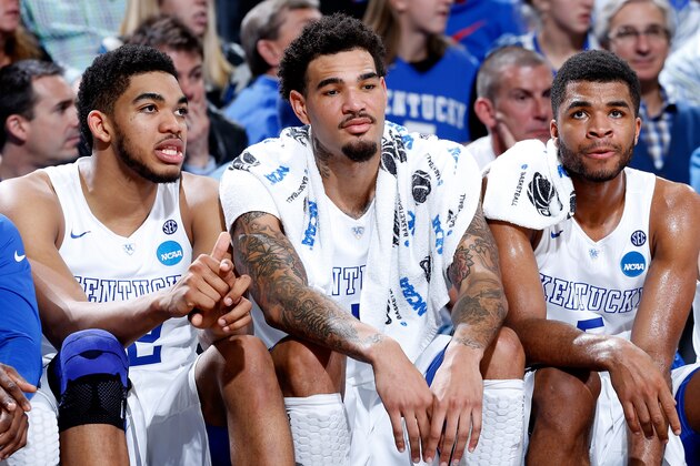 LOUISVILLE, KY - MARCH 19: (L-R) Karl-Anthony Towns #12, Willie Cauley-Stein #15, and Andrew Harrison #5 of the Kentucky Wildcats sit on the bench in the second half against the Hampton Pirates during the second round of the 2015 NCAA Men's Basketball Tournament at the KFC YUM! Center on March 19, 2015 in Louisville, Kentucky.  (Photo by Joe Robbins/Getty Images)