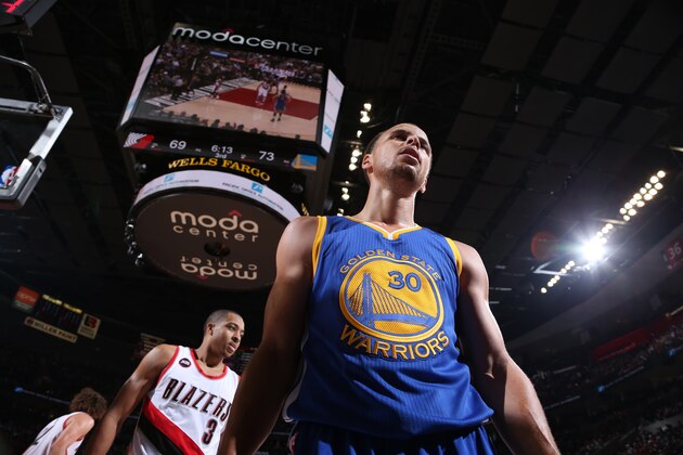 PORTLAND, OR - MARCH 24:  Stephen Curry #30 of the Golden State Warriors and C.J. McCollum #3 of the Portland Trail Blazers during the game on March 24, 2015 at the Moda Center in Portland, Oregon. NOTE TO USER: User expressly acknowledges and agrees that, by downloading and or using this Photograph, user is consenting to the terms and conditions of the Getty Images License Agreement. Mandatory Copyright Notice: Copyright 2015 NBAE (Photo by Sam Forencich/NBAE via Getty Images)